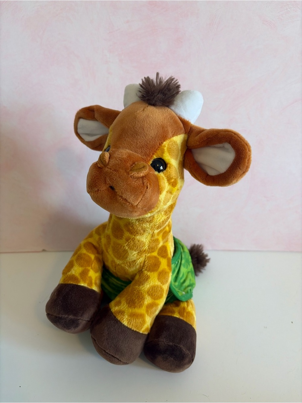 Melissa and Doug baby giraffe in diaper plush toy